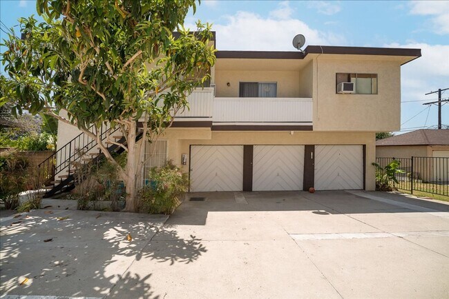 Building Photo - 7100-7104 1/2 Kittyhawk Ave. 1/2-7102