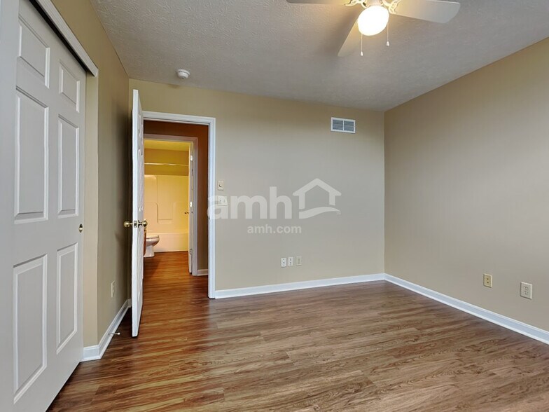 Building Photo - 8676 Woolstone Ct