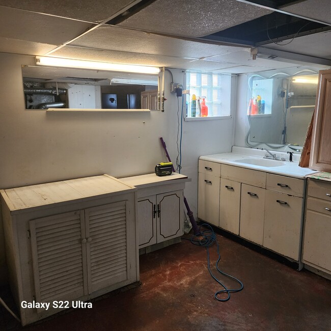 Other view of basement kitchennete with gas line available for stove. - 7141 Jackson Ave