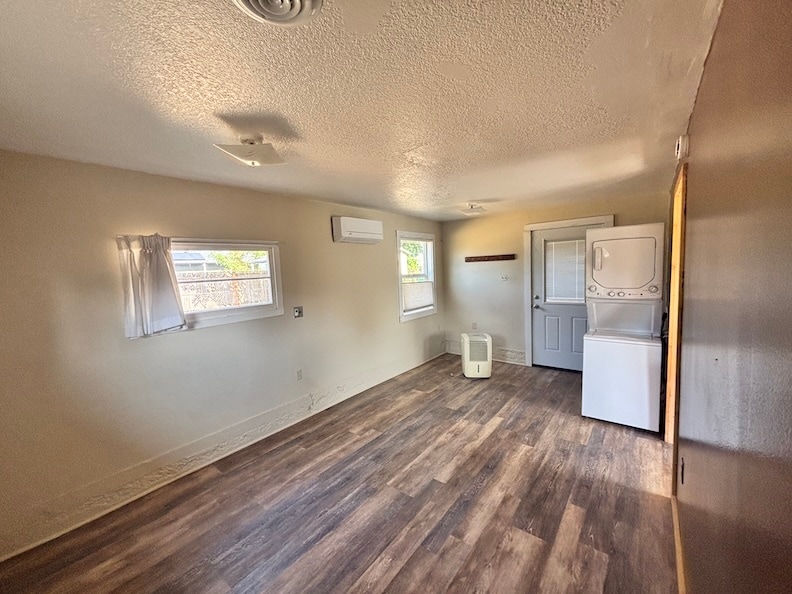 Main room. Mini split (heating/cooling); west windows; north door. - 5636 SE Ogden St
