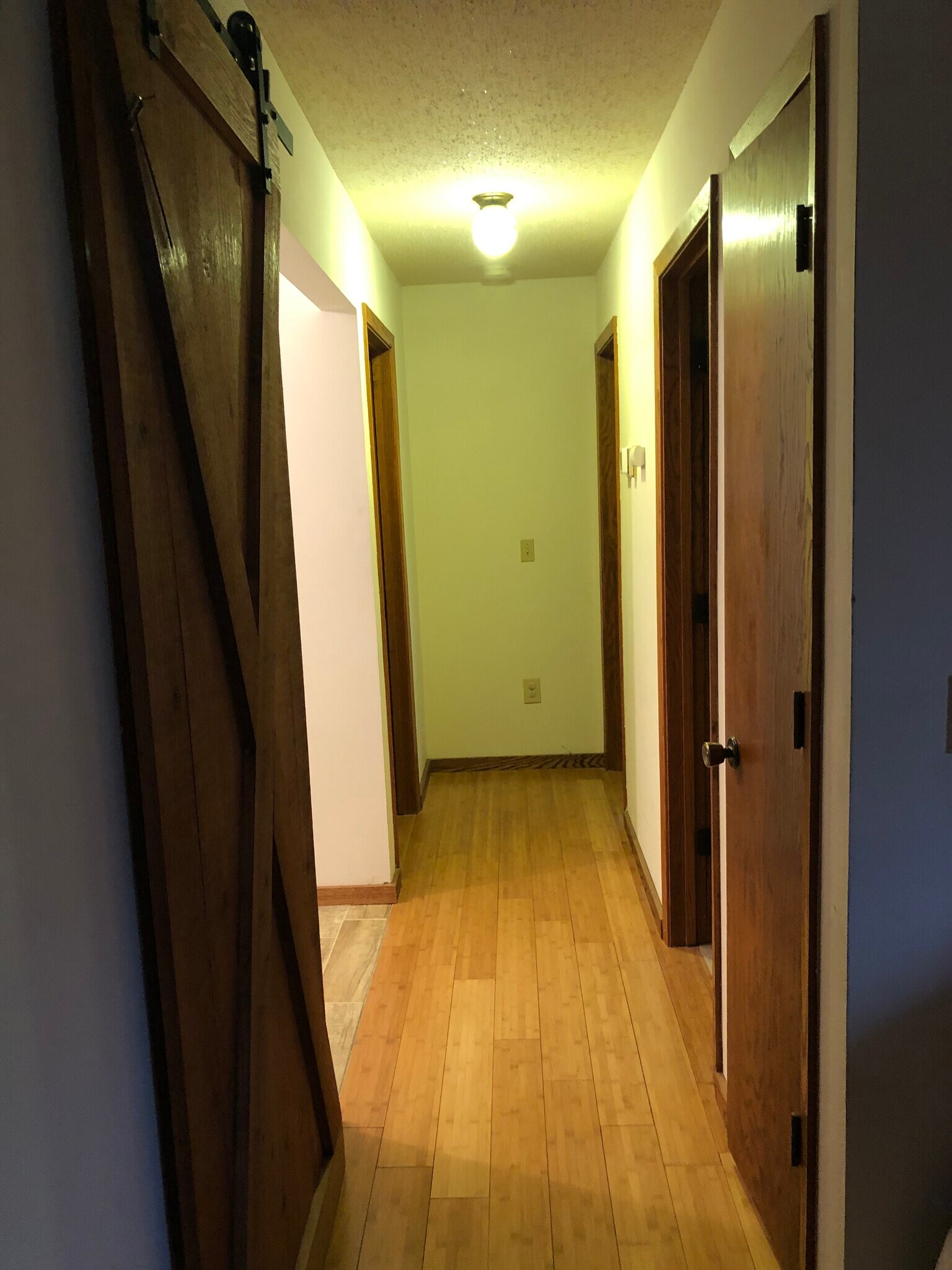 Hallway to Mainfloor Bedrooms and Bathroom - 23260 Bridgestone Rd NW