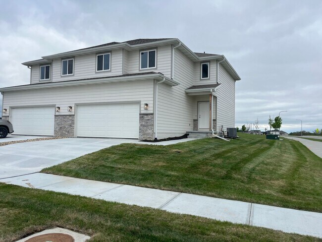 Building Photo - Spacious 5-Bedroom Duplex Near Asbury Elementary with Finished Basement & Full Amenities
