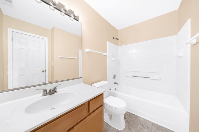 Building Photo - Three Bedroom Two Story Townhome