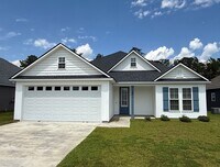 Building Photo - Stylish 4-Bedroom Home with Screened Porch...