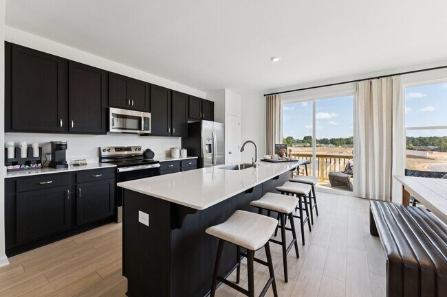 Building Photo - New Construction 4BD, 3.5BA End Unit Raleigh Townhome with Easy Access to Downtown Raleigh