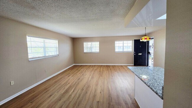 Building Photo - Annual Updated 1BR/1BA Condo – New Interior Finishes, Located on the 2nd Floor