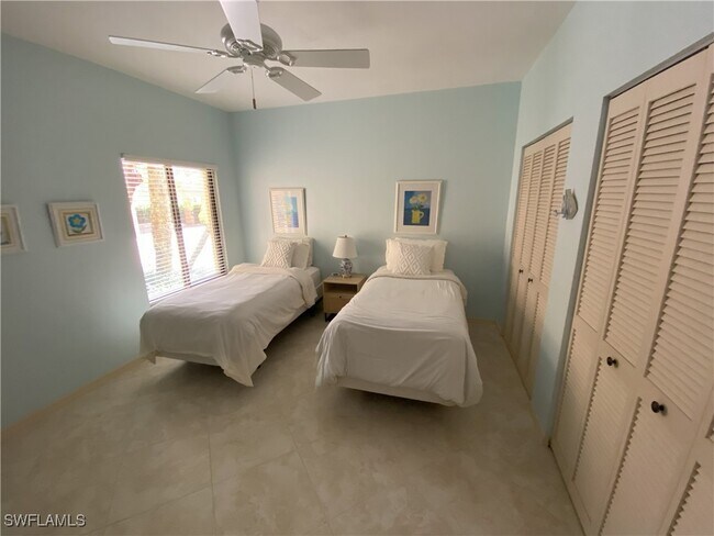 Building Photo - 6760 Pelican Bay Blvd