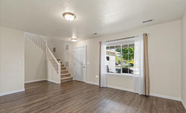 Building Photo - 4995 N Tasman Dr