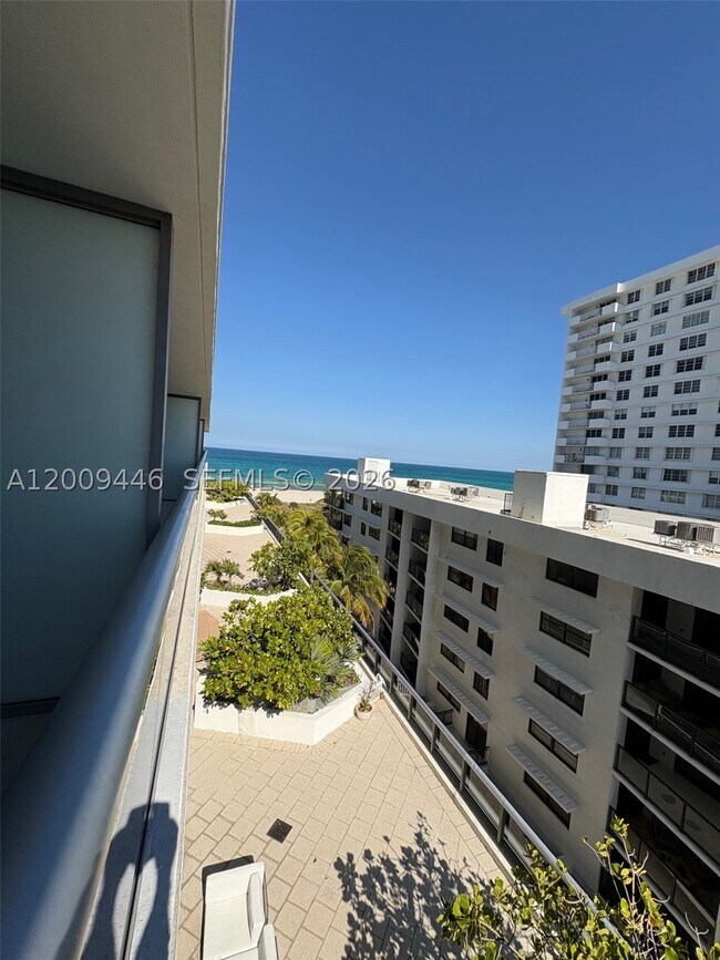 Building Photo - 5875 Collins Ave