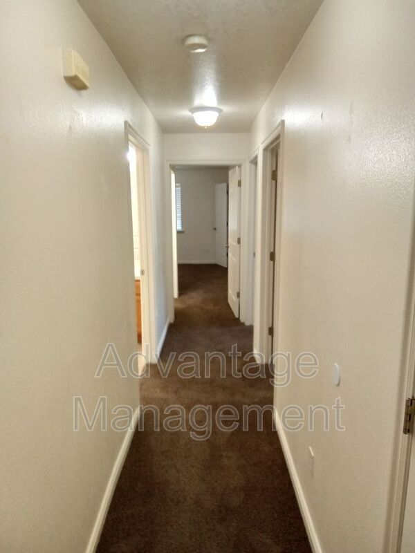 Building Photo - 8083 N Ridge Loop E