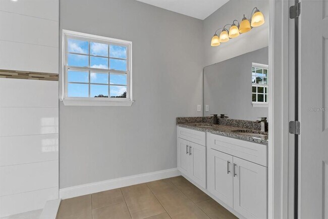Building Photo - 10697 N Dragonis Dr