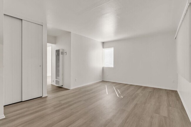 Building Photo - This is a large 2-bdr in a convenient, Freshly painted, updated kitchen counter tops and cabinets