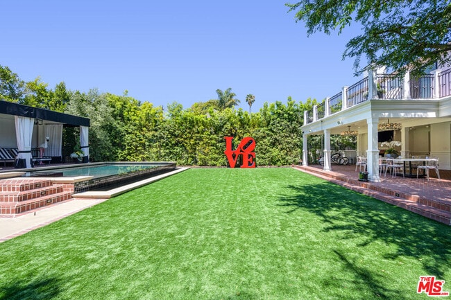 Building Photo - 9885 Carmelita Ave
