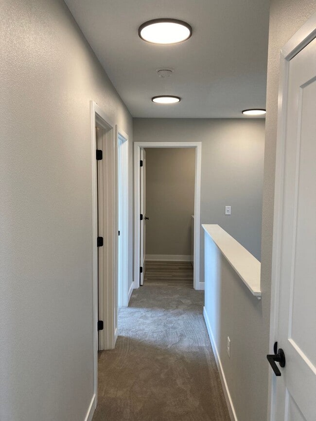 Building Photo - Spacious 4-Bedroom Home with 2-Car Garage & Yard