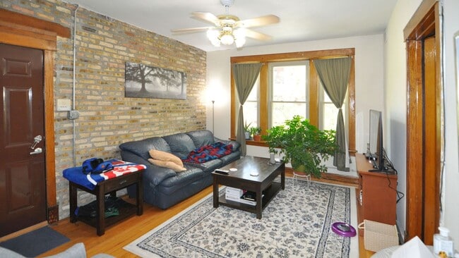 Building Photo - Sunny Large 1 Bedroom with Separate Living and Dining Rooms. Outdoor Space. Free Internet