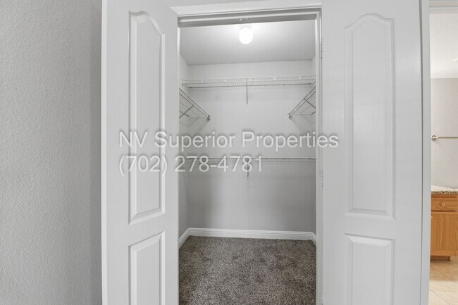 Building Photo - SW!! First floor unit with Balcony!! Gated!! Clubhouse!!  Community pool!! Spa!! Exercise Room!! ...
