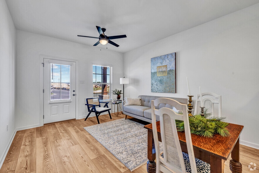 3BR, 2BA - 1,067SF - Living Room/Dining Room - Cottages at Morganfield - Rental Homes