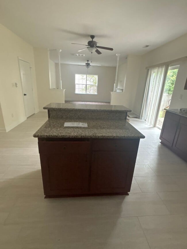 Building Photo - Spacious 4-Bedroom Home Near Base – No Tun...