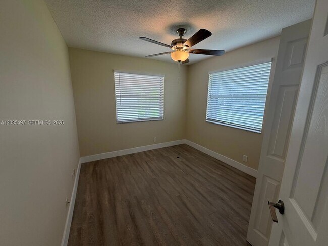 Building Photo - 8443 Royal Palm Blvd