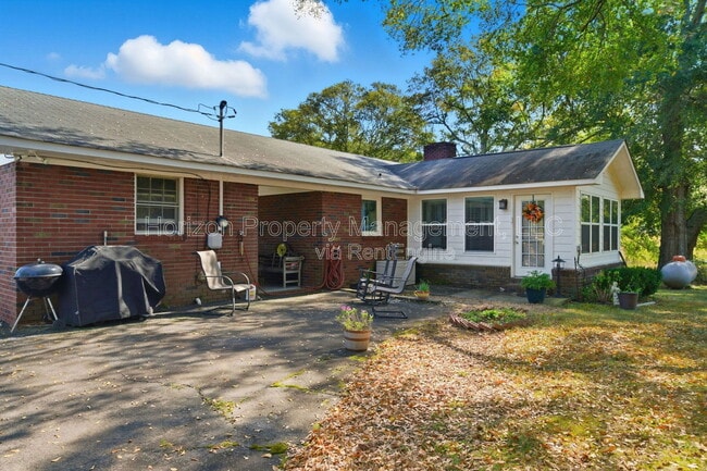 Building Photo - 8730 Jot Em Down Rd