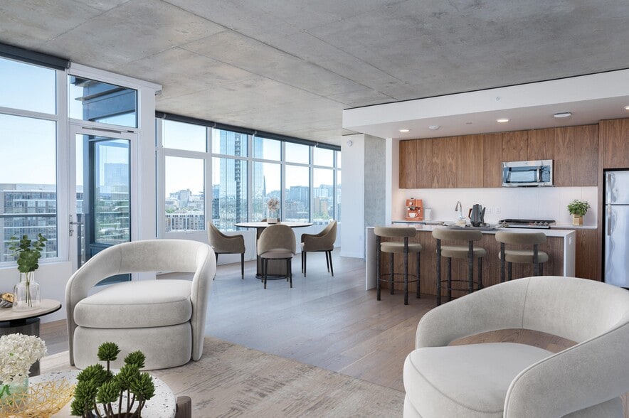 Beautifully designed interiors with high ceilings, oversized windows, and custom roller shades - The Sutton