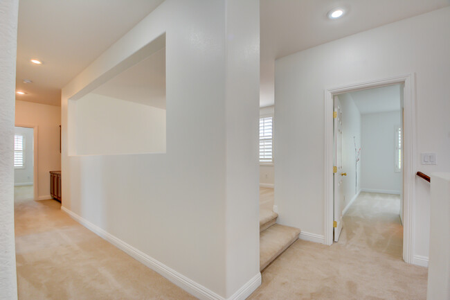 Hallway to bedrooms - 7625 Duet Springs St