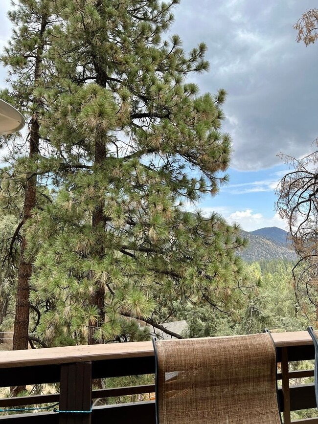 Building Photo - Cozy 3-Bed 2-Bath Cabin-Style Home Nestled...