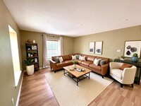 Building Photo - *MOVE IN SPECIAL* Upstairs Condo with Premium Amenities & Hardwood Floors!