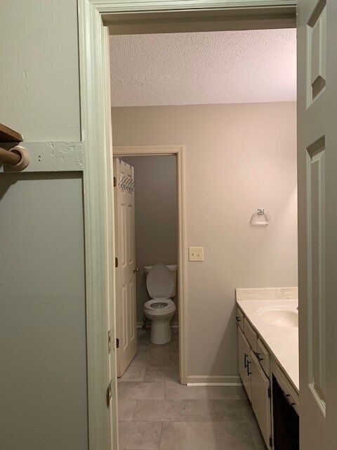 Bedroom 1 dedicated bathroom from closet - 6020 Sand Wedge Cir