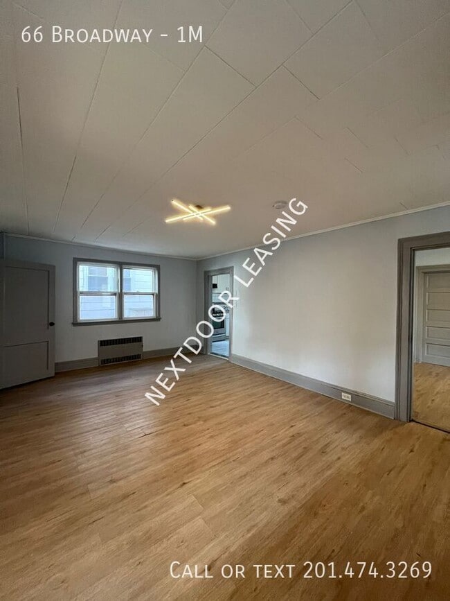 Building Photo - 66 Broadway-1M