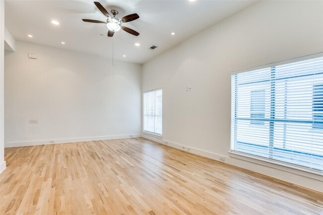 Building Photo - Beautiful townhome featuring granite countertops, hard wood floors, and a small private yard grea...