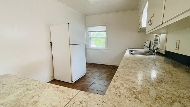 Building Photo - Key Investments-1315 N. State St.