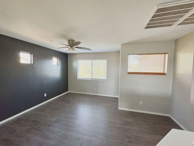 Building Photo - 4BR / 2.5BA Home with Expansive Lot – 2-Car Garage, Community Pools & Golf