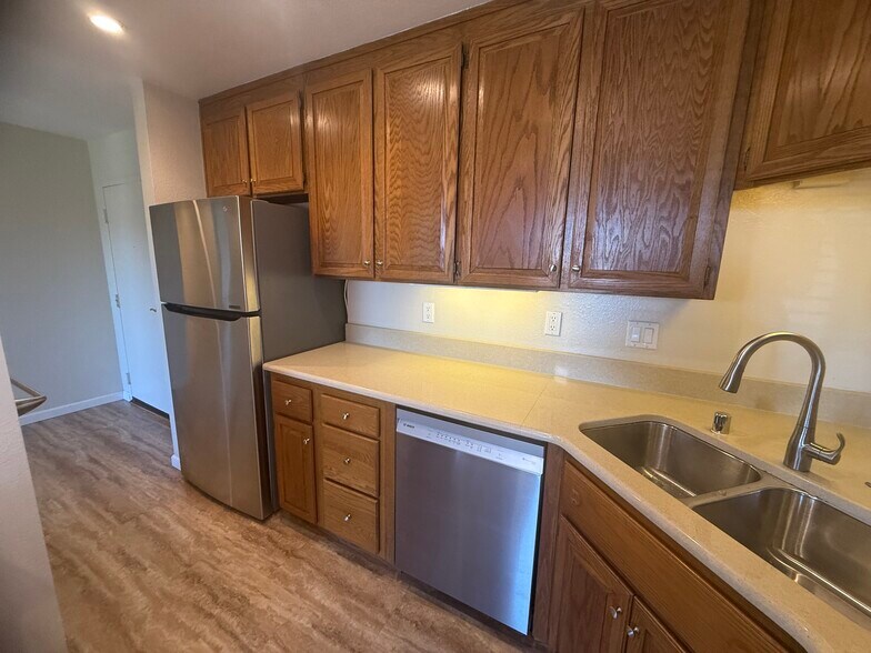 Kitchen with new appliances - 815 Sea Spray Ln