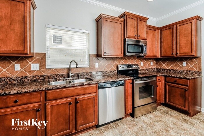 Building Photo - 6608 Championship Dr