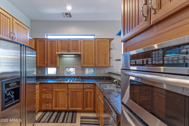 Building Photo - 14450 N Thompson Peak Pkwy