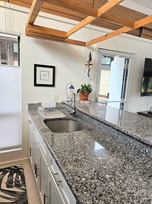 Building Photo - Furnished Waterfront Bungalow with Pool Ac...