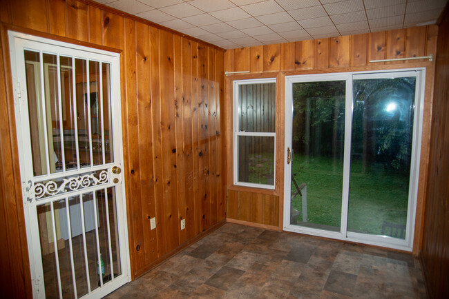 Mud room between garage and house. - 1911 Talmage Ave SE