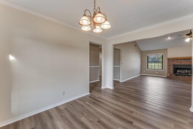 Building Photo - East Fayetteville 3-Bedroom Home with Granite Touches & Cozy Fireplace!"