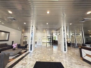 Building Photo - 3675 N Country Club Dr