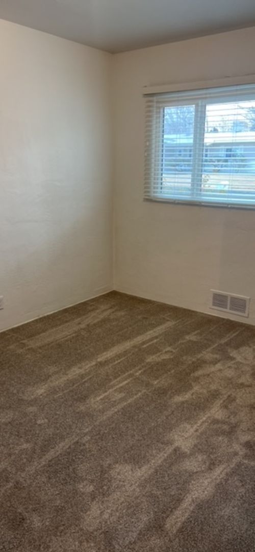 Building Photo - Nice 3 Bedroom 2 Bathroom, 2 Living areas. NE Heights, with plenty of room to roam inside and out