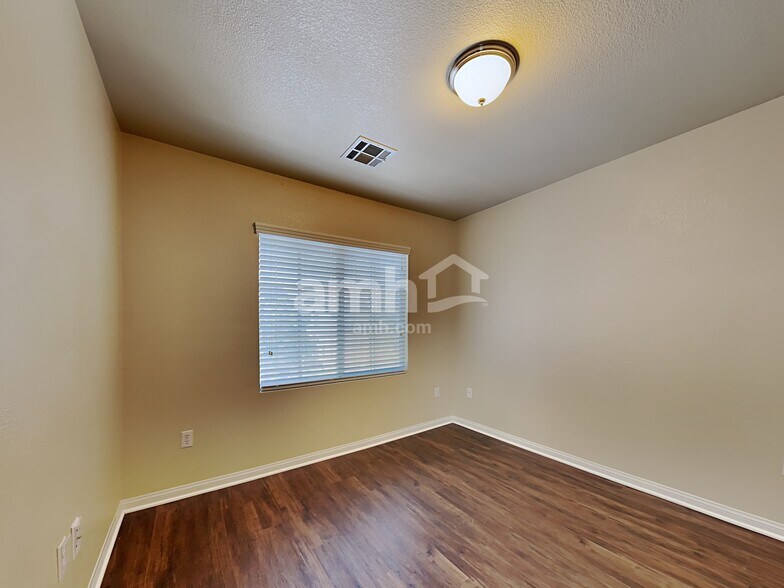 Building Photo - 8164 Golden Flowers St