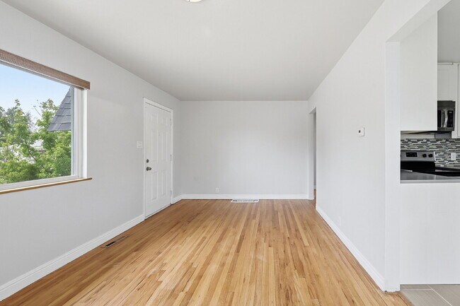 Building Photo - $2,140.95 -  2 bed, 1 bath located in Denver with a big backyard and In Unit Laundry!