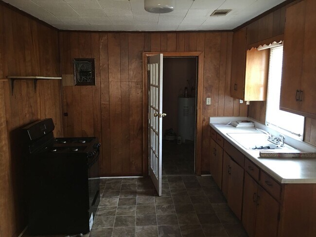 Building Photo - Single Family Home with large fenced back yard