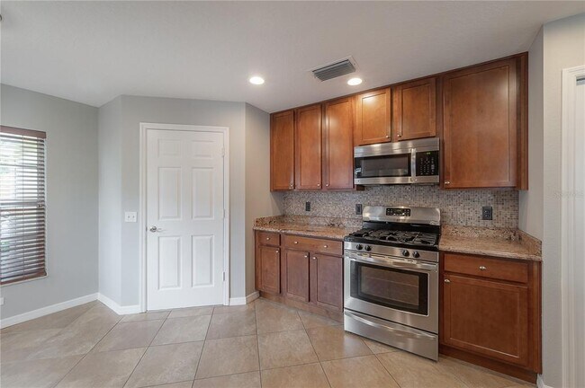 Building Photo - 10248 Woodford Bridge St