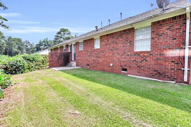 Building Photo - Upgraded Duplex with Huge Yard