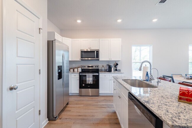 Building Photo - $500 Move-in Discount! Fresh, Modern Living in Bemiss Springs – Stylish New-Construction 3BR Town...