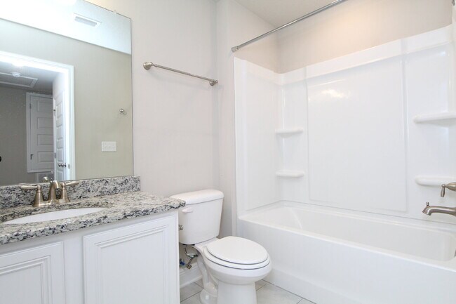 Building Photo - Spacious 3-Bed, 2.5-Bath Townhome Steps from Blue Wahoos Stadium & Palafox Street with Upgraded K...