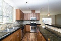 Building Photo - 2BD 2.5BA + Office +  Tri Level Townhouse w/Garage + AC + Balcony + Washer/Dryer Included