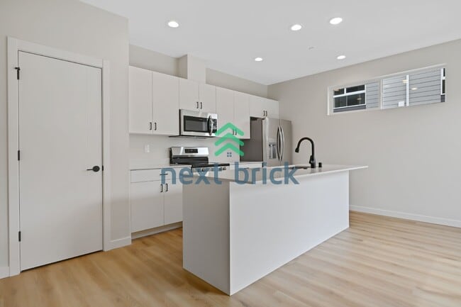 Building Photo - Brand-New 2026 Townhome | 3 Bed | 2.5 Bath | 1,560 Sq Ft | EV Garage | A/C Included